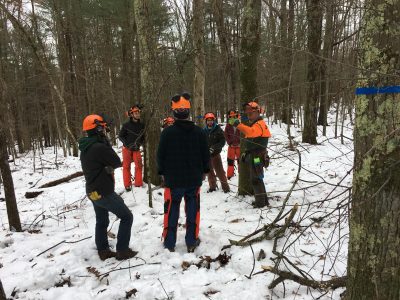 forestry class out in the woods in the winter